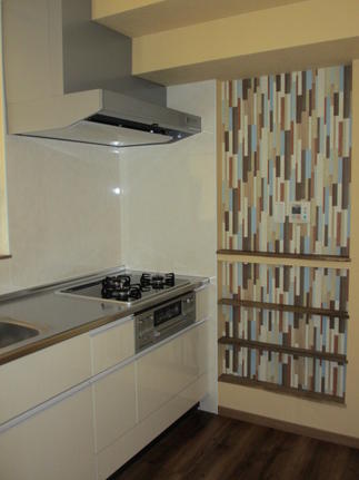 壁面収納がアクセントになってお洒落なキッチンになりました。