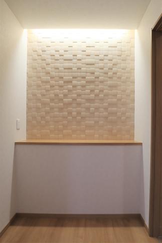 エコカラットと間接照明でおしゃれな玄関