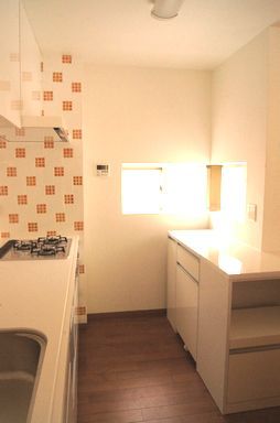 造作壁対面キッチンから壁付型キッチンへ