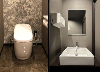 L型のトイレ空間にトイレとベッセル式手洗いを配置