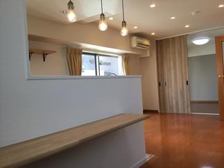 壁を取りオープンなLDKへ