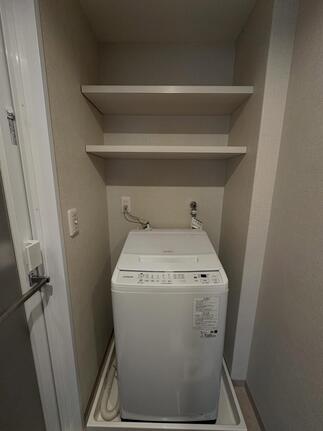 After　洗濯機上固定棚