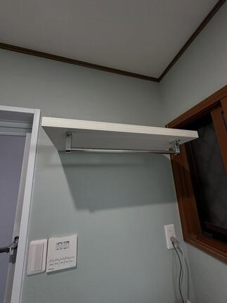 After　洗濯機上一枚板収納設置