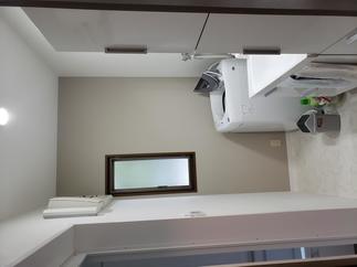 清潔感のある白を基調とした洗面脱衣室